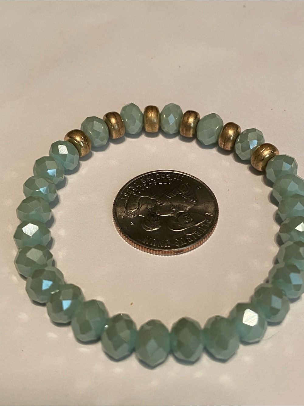 Faceted Mint Stretch Bracelet with Gold Accent Beads